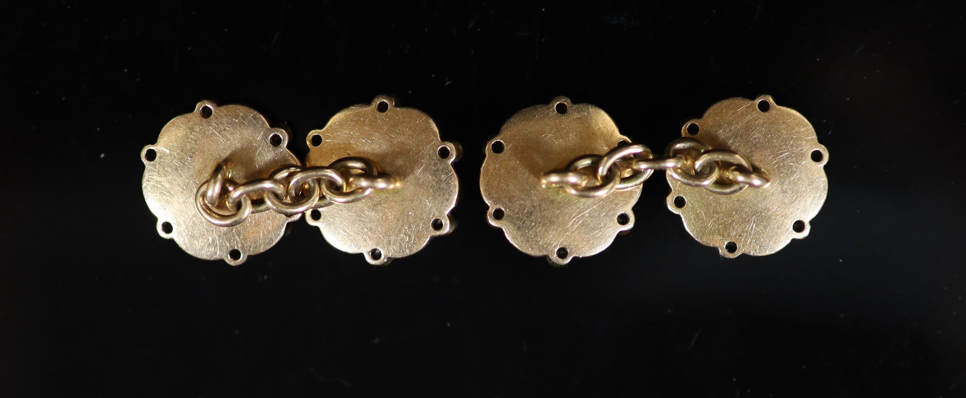 A pair of early 20th century gold, two colour enamel, seed pearl and diamond set cufflinks